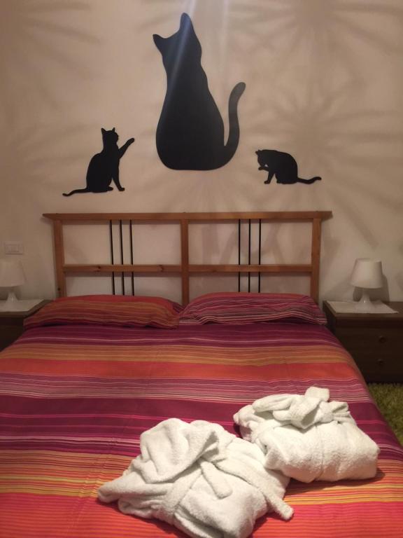 A bed or beds in a room at CA' del GIACOMINO