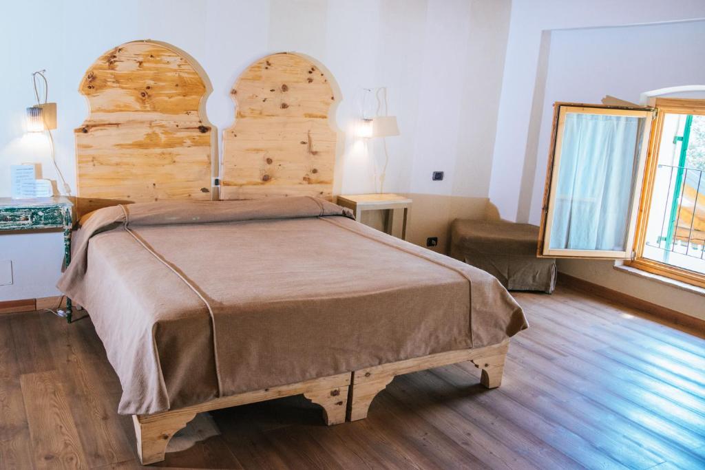 Postel nebo postele na pokoji v ubytování Cascina Girolda