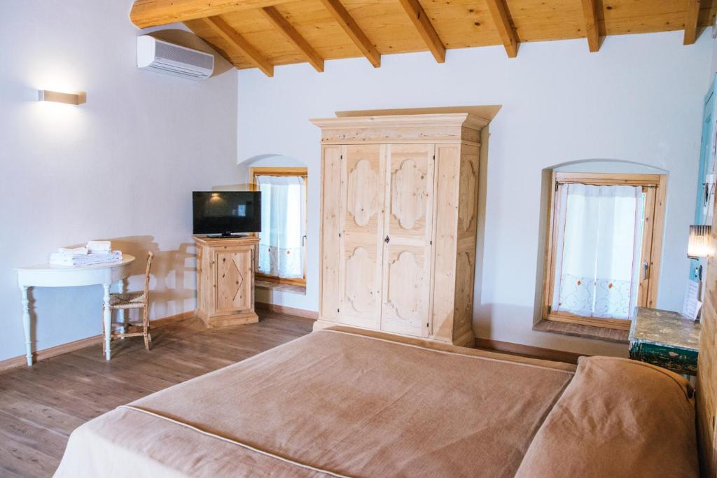 Postel nebo postele na pokoji v ubytování Cascina Girolda