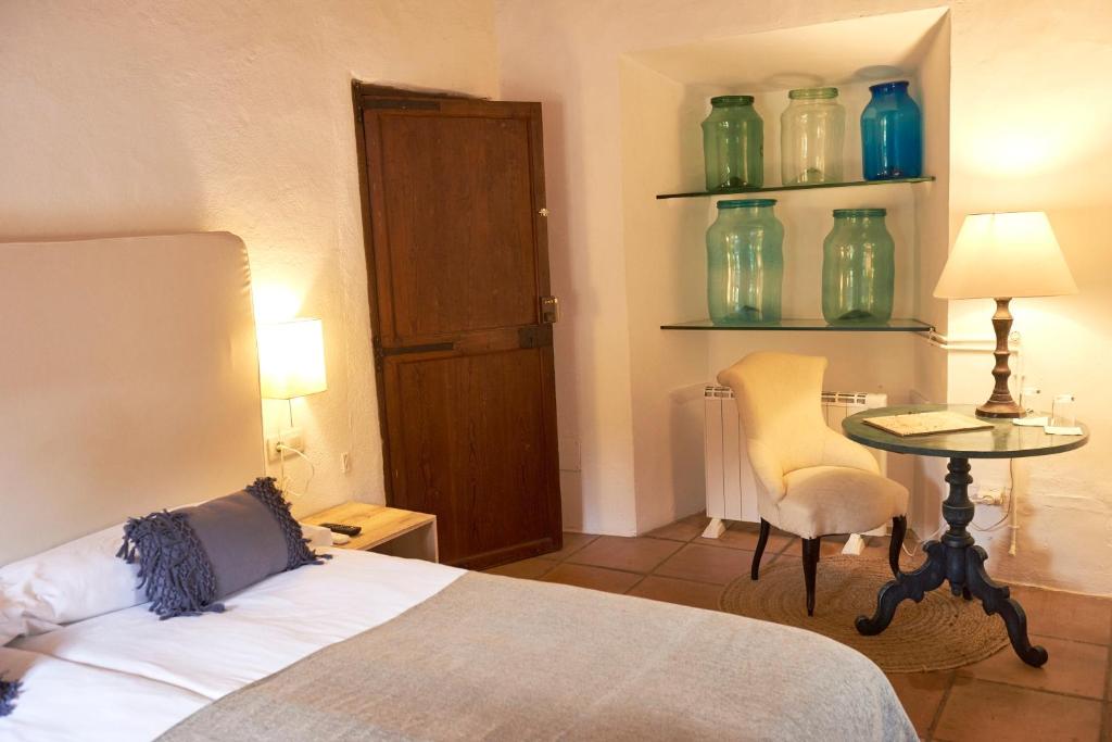 Postel nebo postele na pokoji v ubytování Mirabó de Valldemossa
