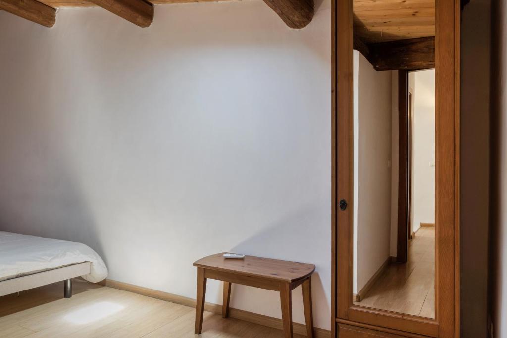 Łóżko lub łóżka w pokoju w obiekcie Alcalà Living Apartments