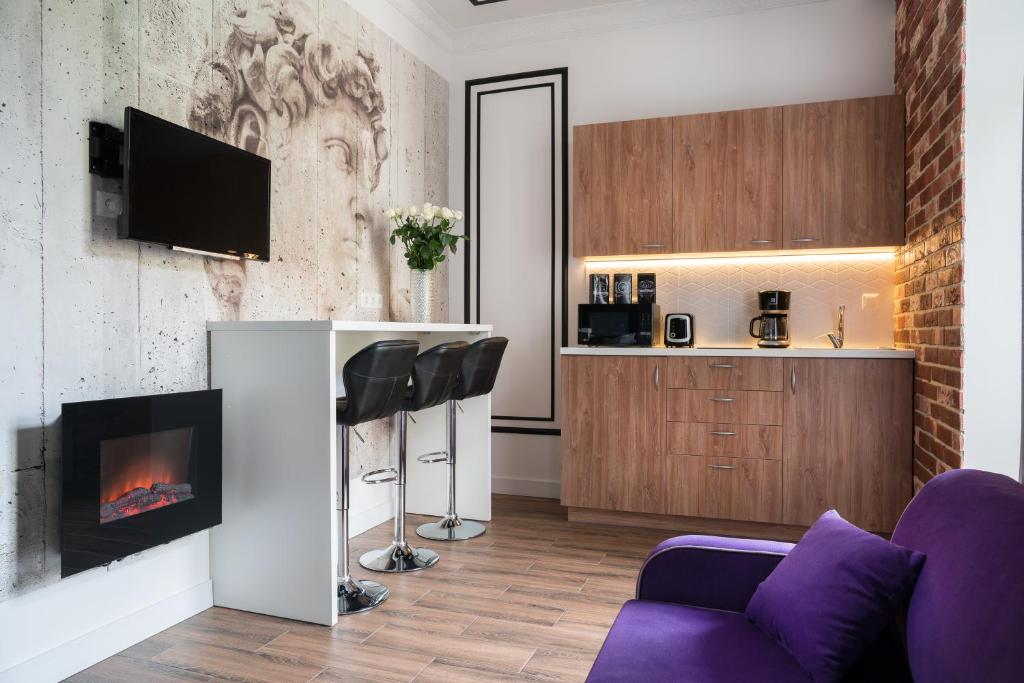 Kuchyň nebo kuchyňský kout v ubytování Theatre Boutique Apartments