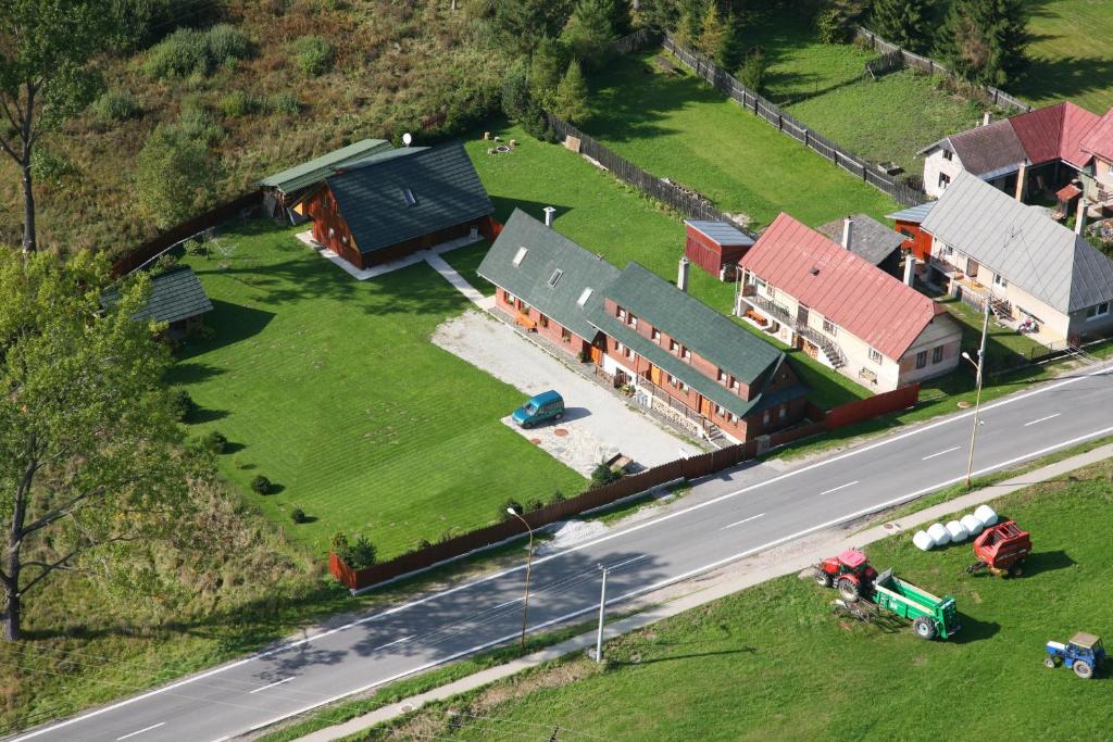 an aerial view of a house next to a road at Zubrovica in Telgárt