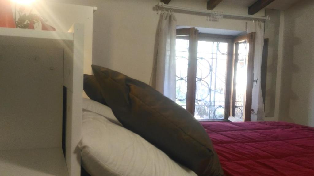 Postel nebo postele na pokoji v ubytování Baduerughe - ValledelLago