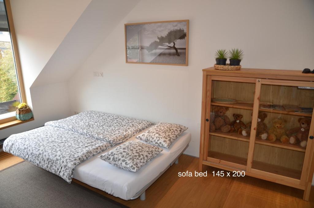 Postel nebo postele na pokoji v ubytování i Design Apartment