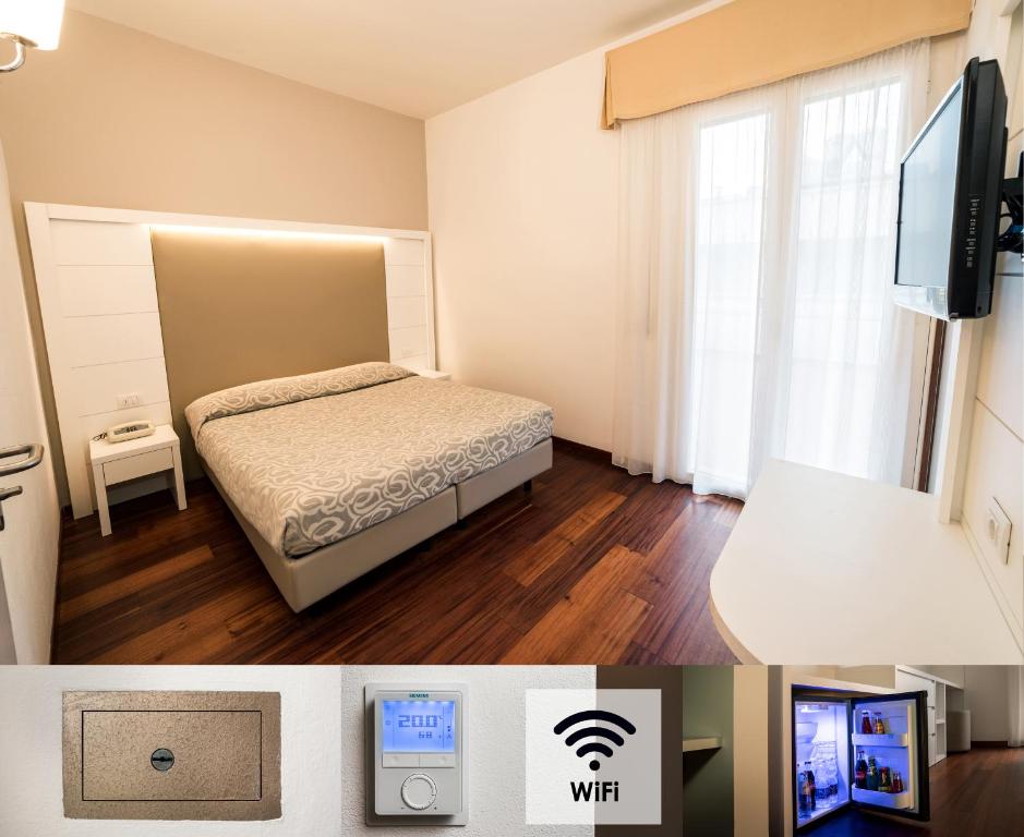 TV a/nebo společenská místnost v ubytování Hotel Alexander