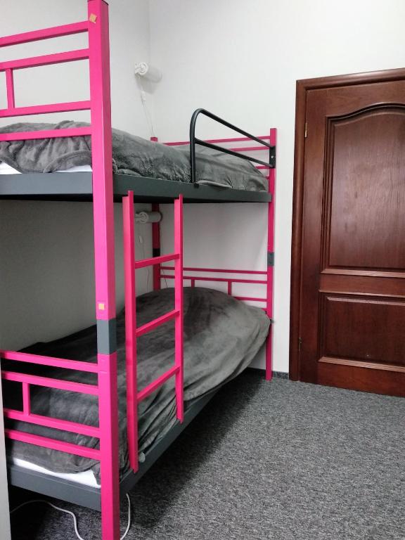 Postel nebo postele na pokoji v ubytování Rodmos Hostel