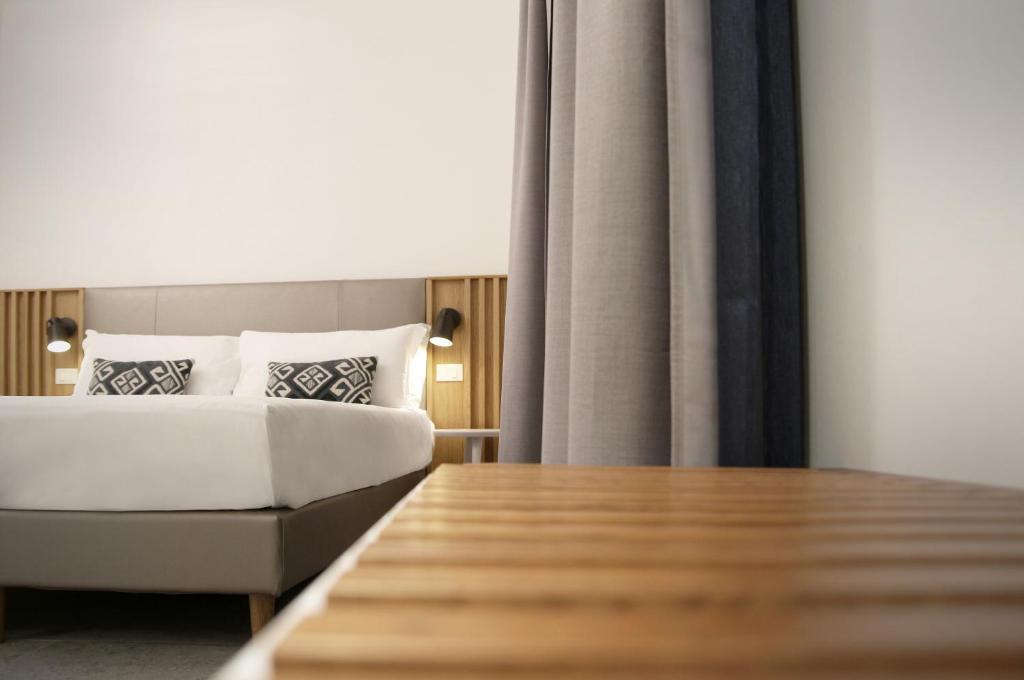 Postel nebo postele na pokoji v ubytování Colonna 24 Luxury Room in Portovenere near 5 Terre