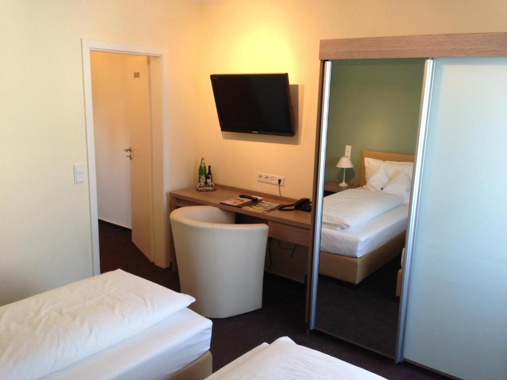 Postel nebo postele na pokoji v ubytování Hotel Destination 21