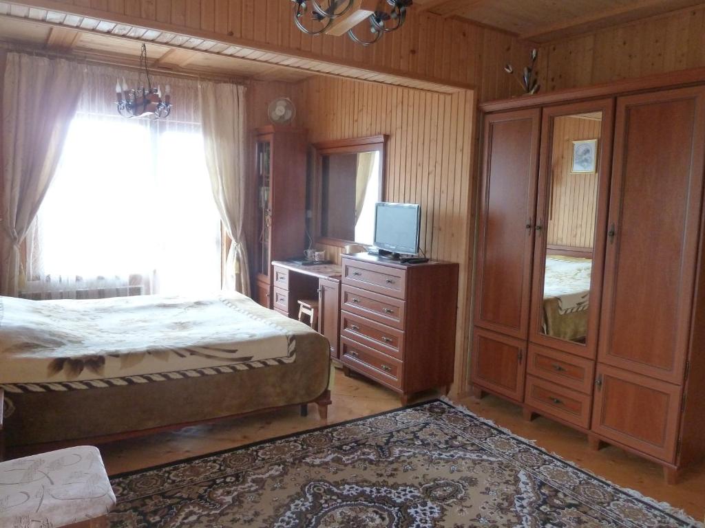 Postel nebo postele na pokoji v ubytování U Olgi
