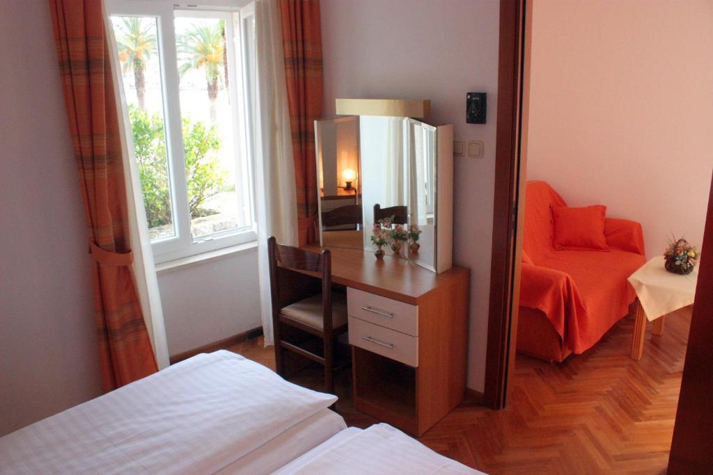 Voodi või voodid majutusasutuse Hotel Concordia toas