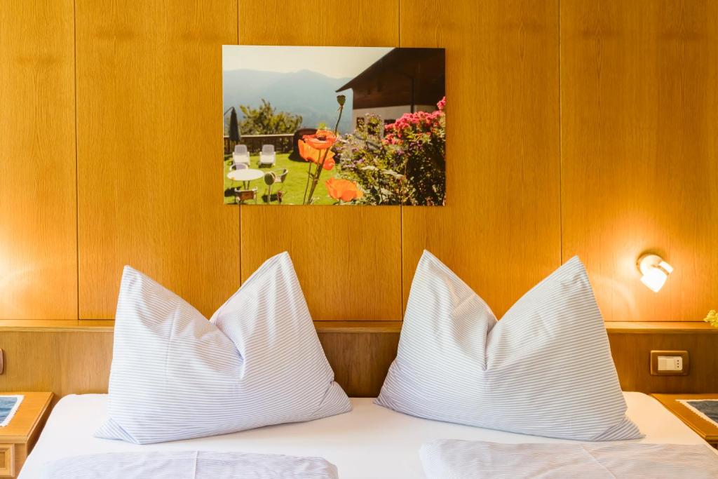 Postel nebo postele na pokoji v ubytování Thalerhof Tiers