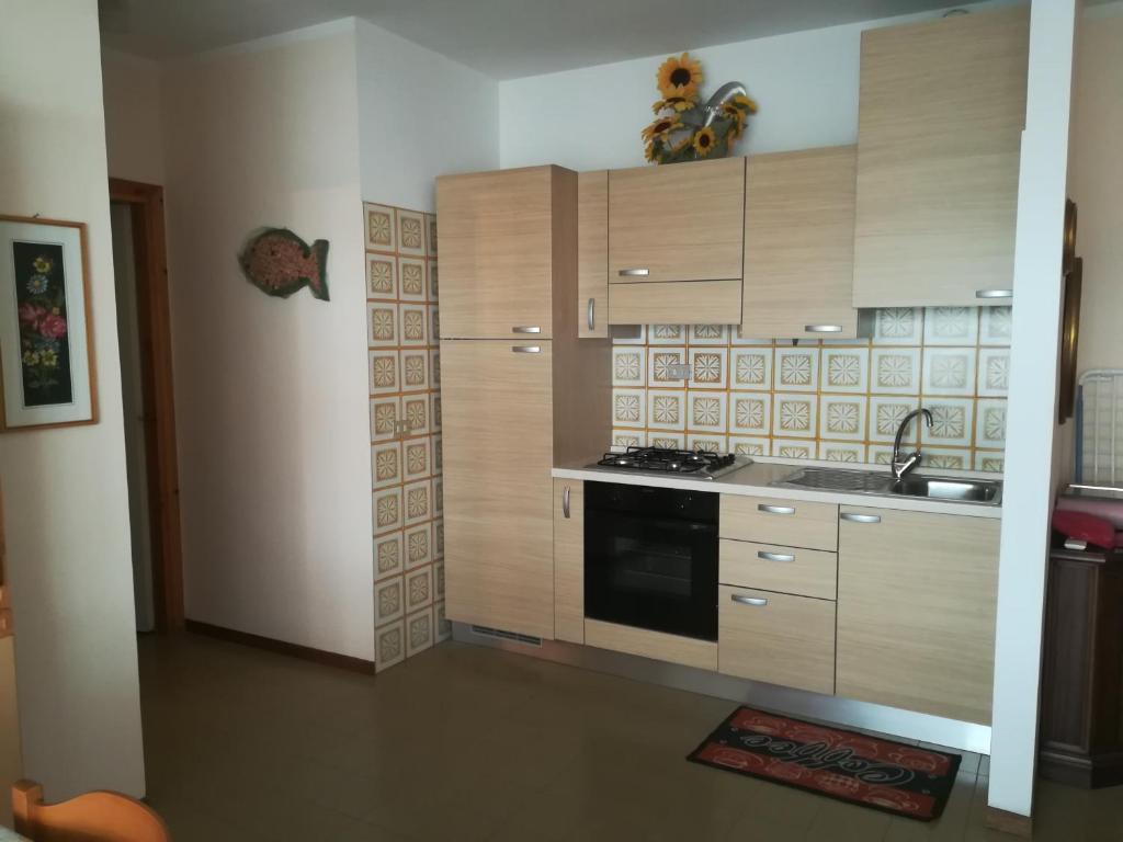 Kuchyňa alebo kuchynka v ubytovaní Appartamento ''La Piana''