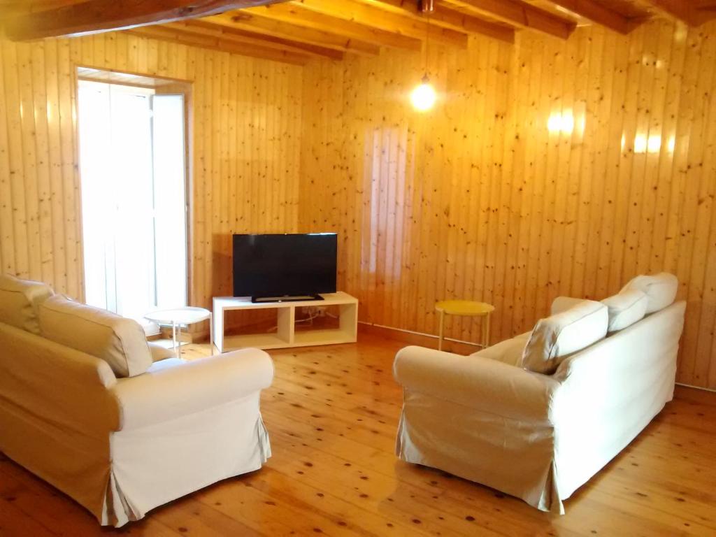 Televízia a/alebo spoločenská miestnosť v ubytovaní A Casa De Regina