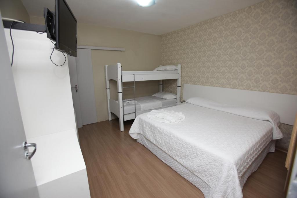 Postel nebo postele na pokoji v ubytování Pousada Quedas D'água