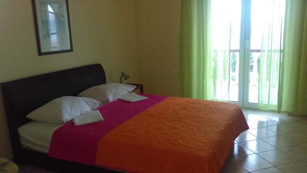 Posteľ alebo postele v izbe v ubytovaní Guesthouse BILI