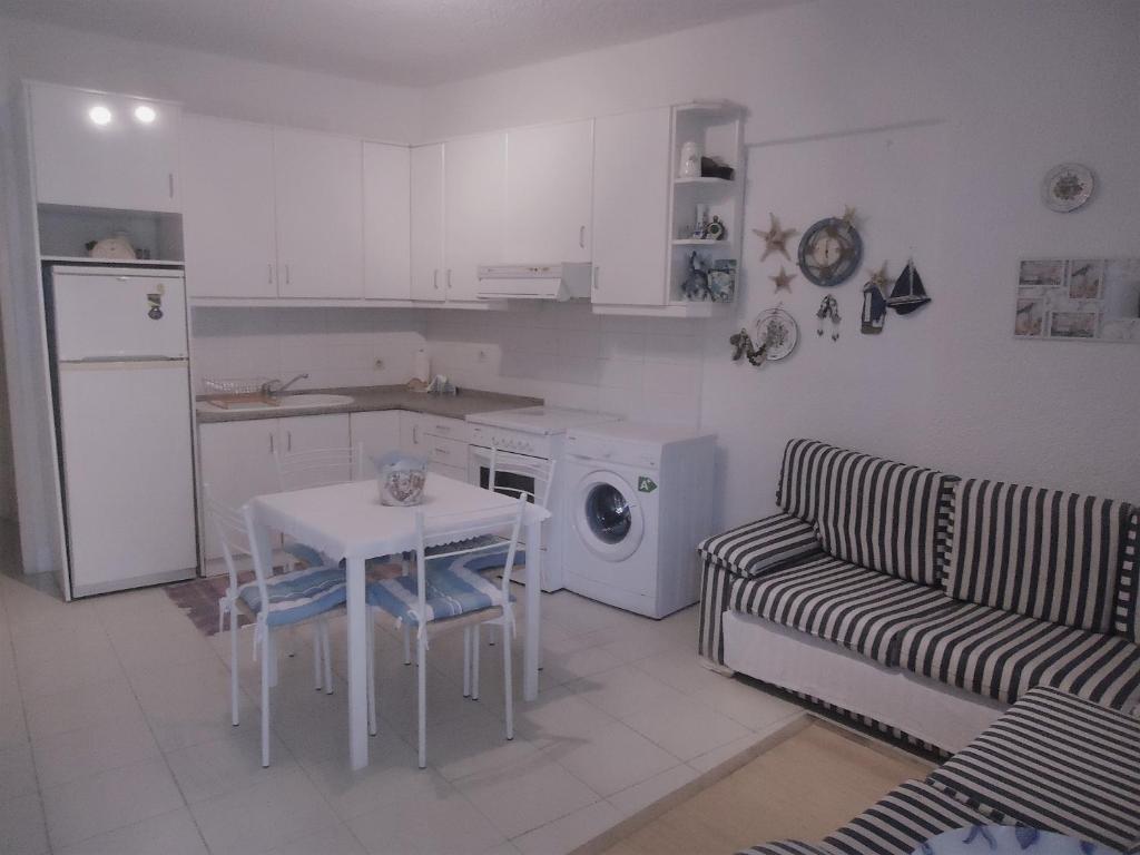 A kitchen or kitchenette at Hippocampus Beach House