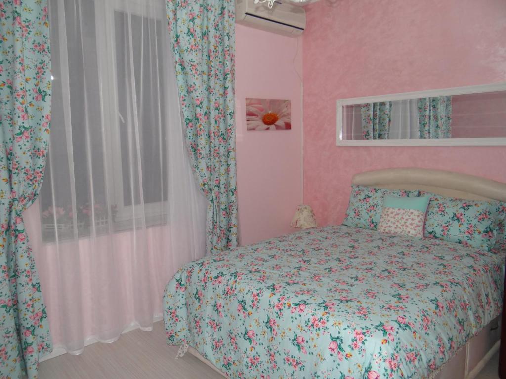 Postel nebo postele na pokoji v ubytování Orange Flower Apartments