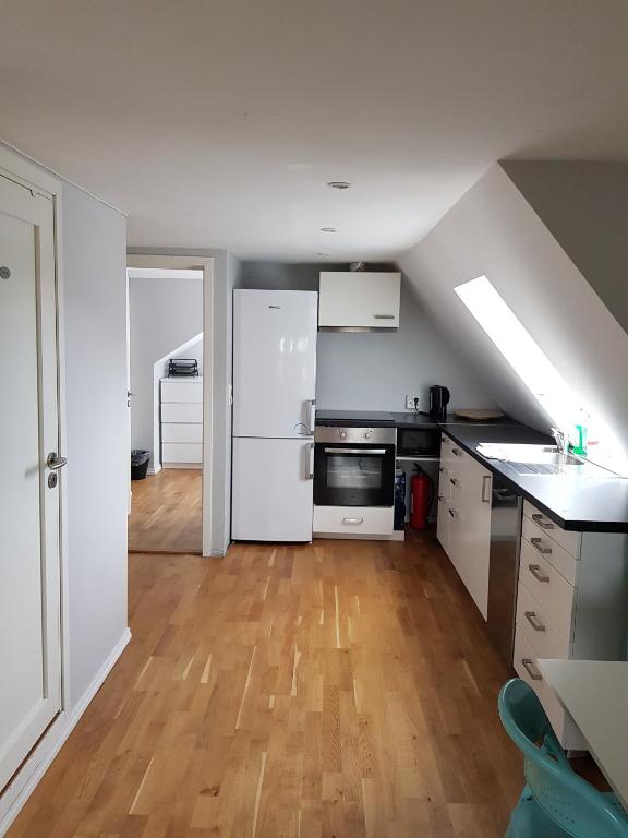 Kuchyň nebo kuchyňský kout v ubytování Skuteviken Apartments 40