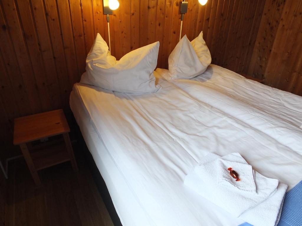 Postel nebo postele na pokoji v ubytování apartment Neðra-Vatnshorn