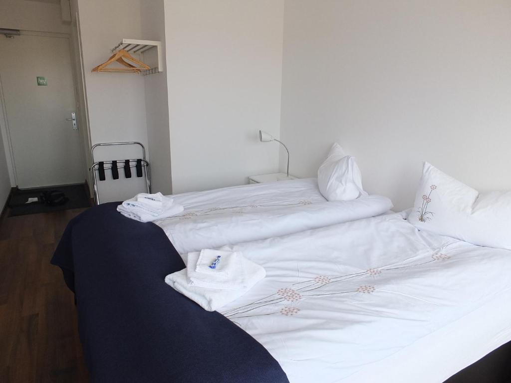 Postel nebo postele na pokoji v ubytování apartment Neðra-Vatnshorn