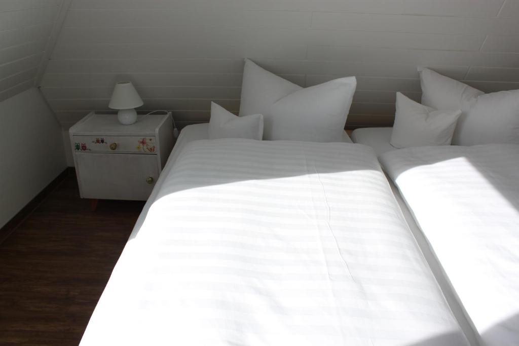 Postel nebo postele na pokoji v ubytování Hotel Fresena