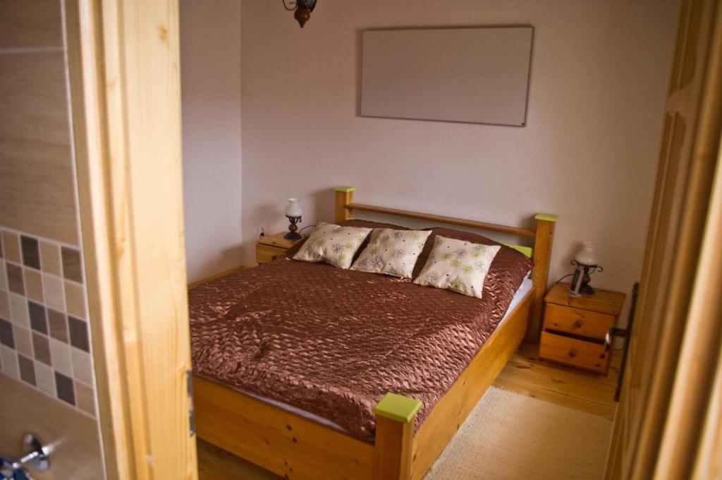 Postel nebo postele na pokoji v ubytování Harmatcsepp-Vendégház