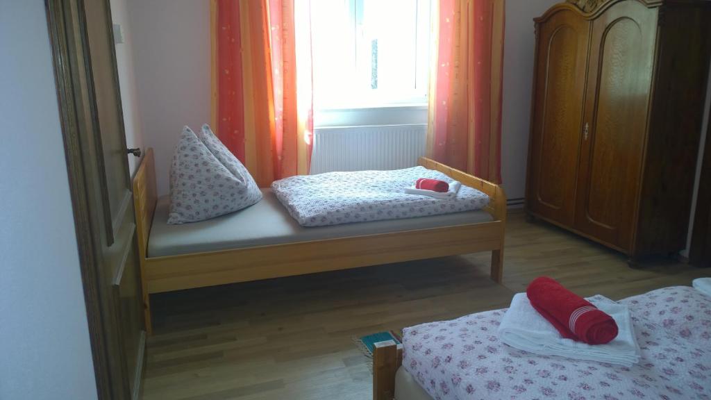 Postel nebo postele na pokoji v ubytování Chalupa u kostela