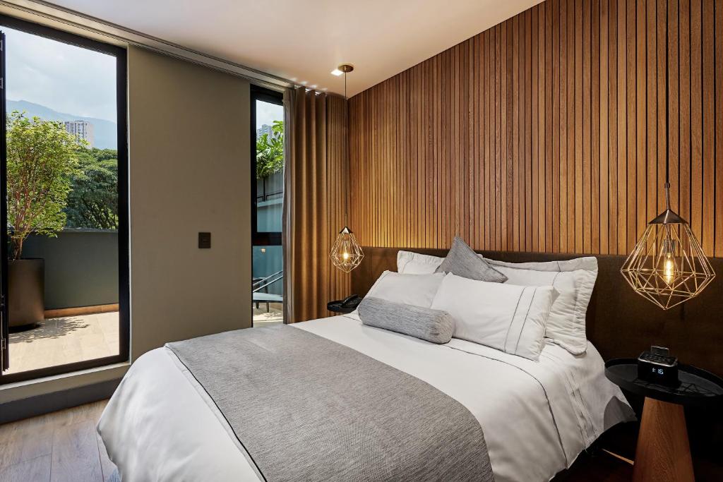 Postel nebo postele na pokoji v ubytování 14 Urban Hotel