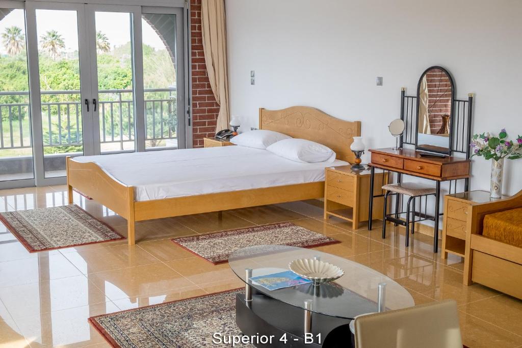 Postel nebo postele na pokoji v ubytování Ionion Star Hotel