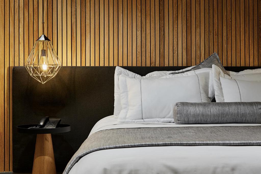 Postel nebo postele na pokoji v ubytování 14 Urban Hotel