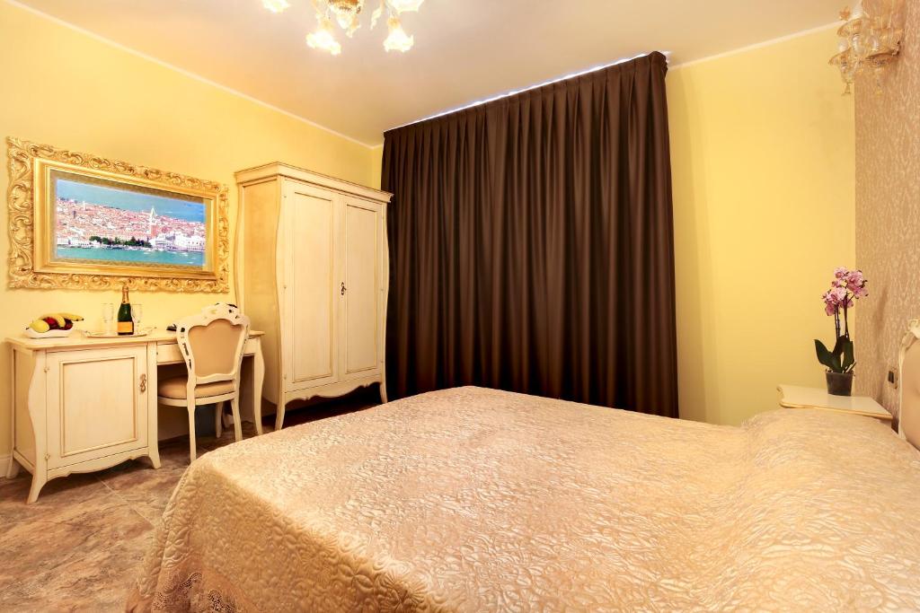 Postel nebo postele na pokoji v ubytování New Reiter Hotel