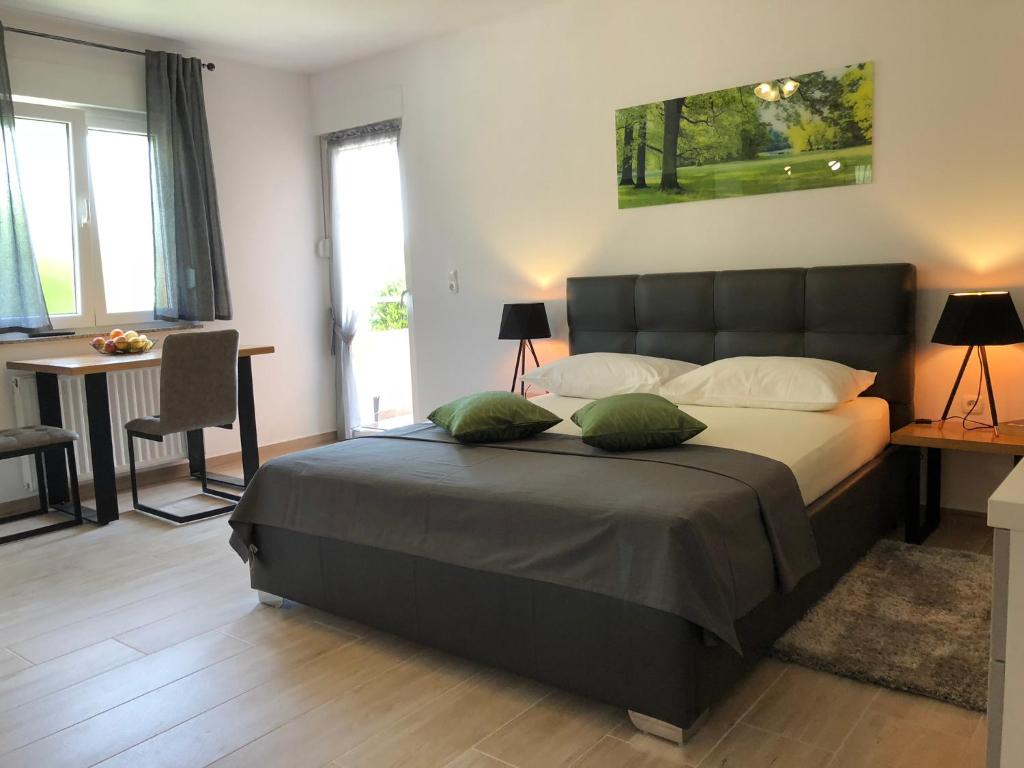 Postel nebo postele na pokoji v ubytování Apartmani Učka