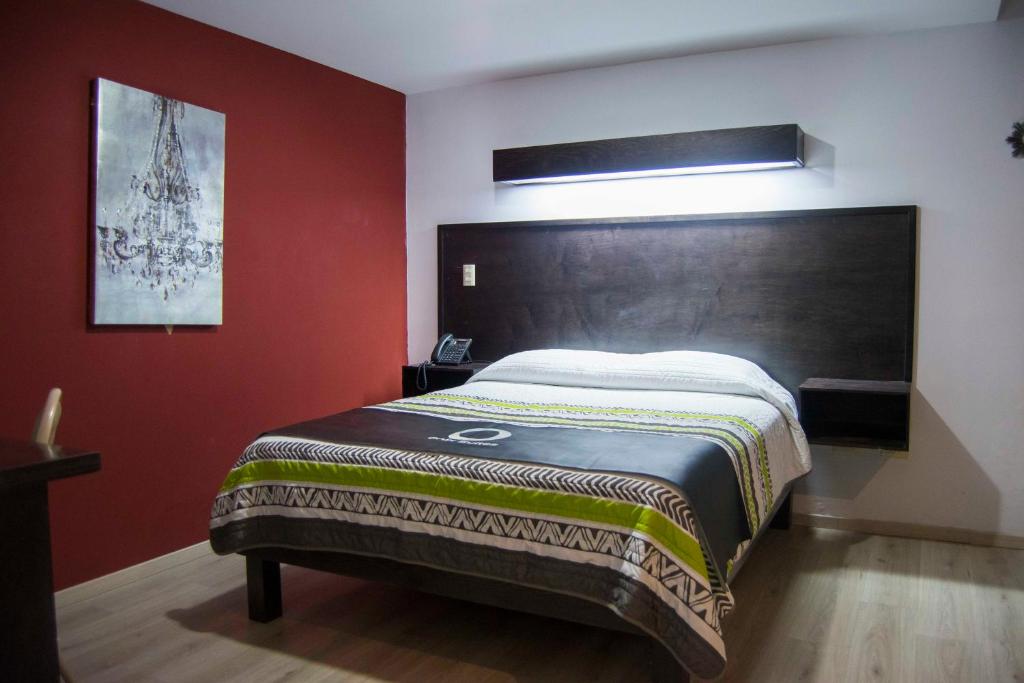 Krevet ili kreveti u jedinici u okviru objekta Hotel Onix Suites