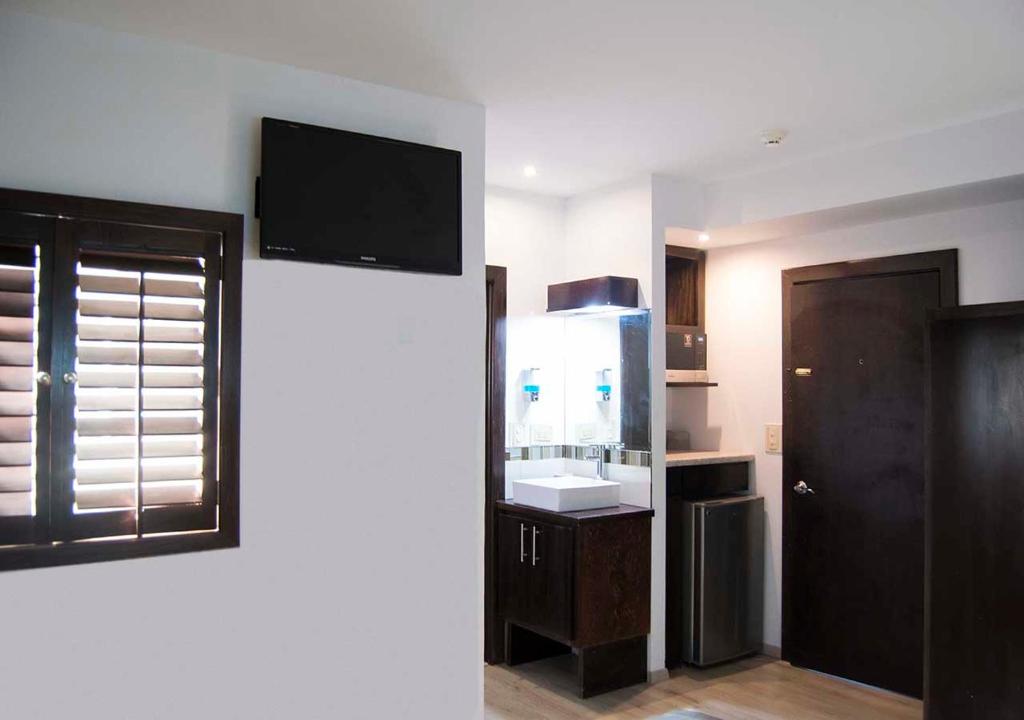 Kuhinja ili čajna kuhinja u objektu Hotel Onix Suites