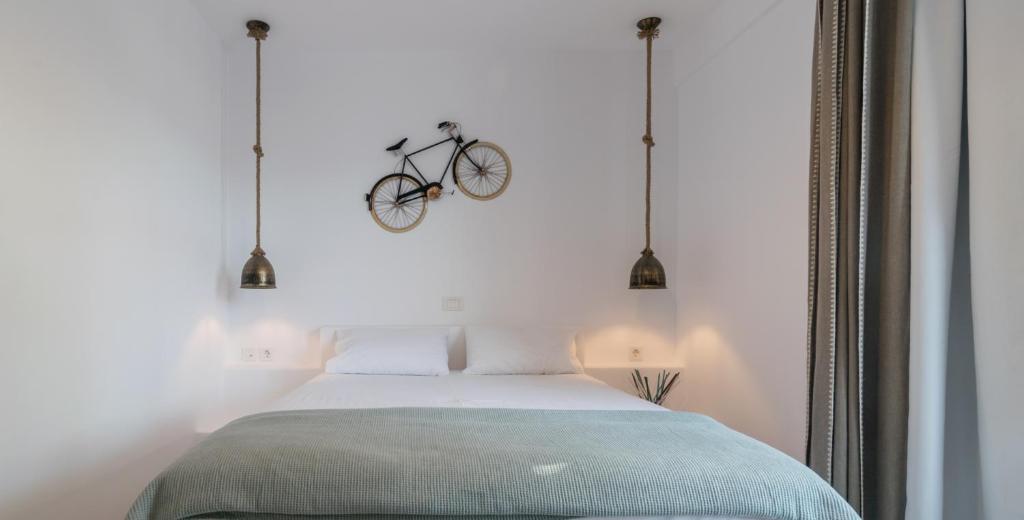 Łóżko lub łóżka w pokoju w obiekcie Giannoulis Hotel