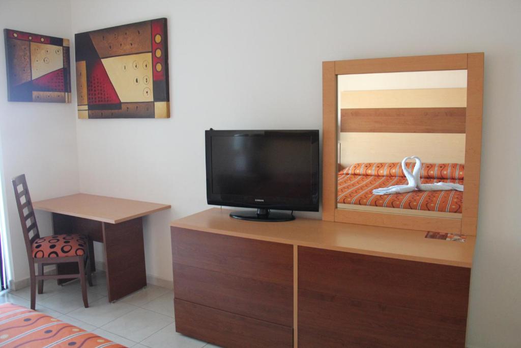 TV a/nebo společenská místnost v ubytování Hotel Real Zapopan