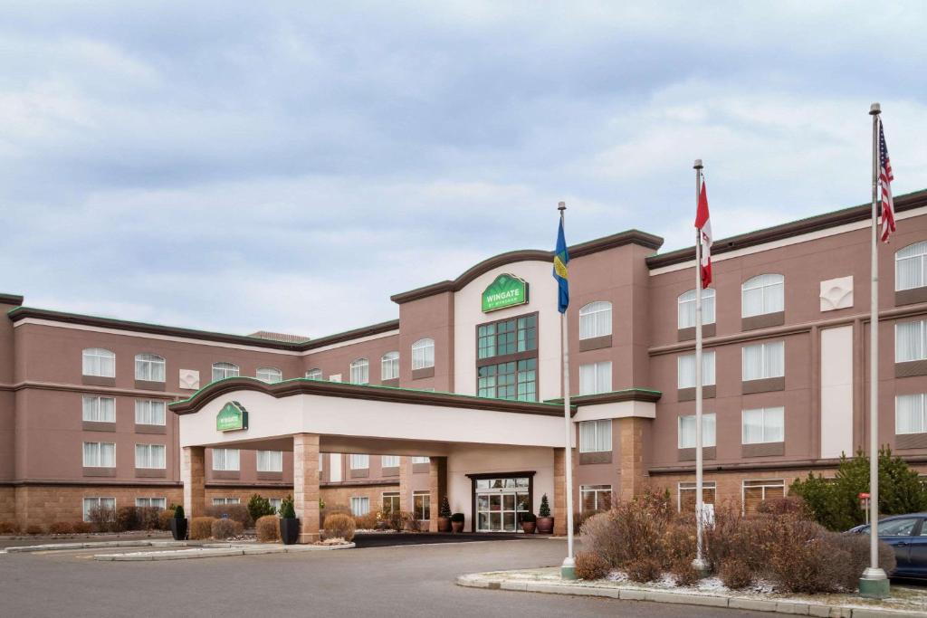 a rendering of the front of a hotel at Wingate by Wyndham Calgary South in Calgary
