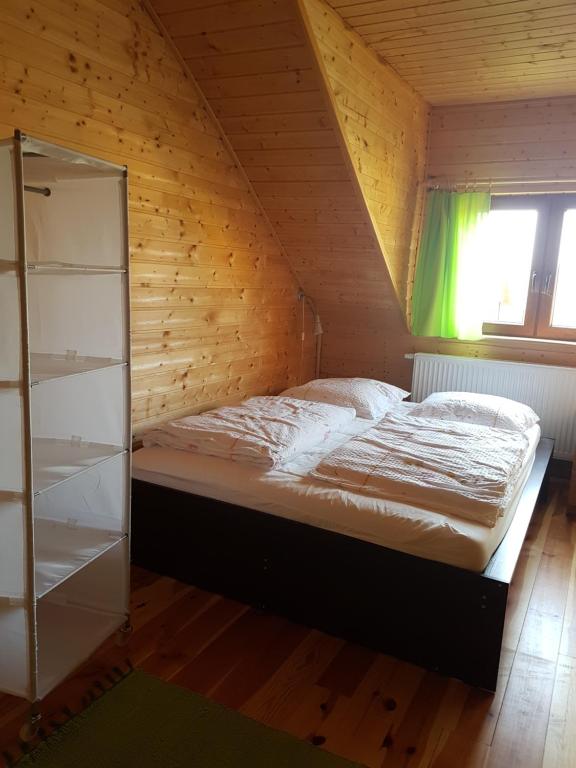 Postel nebo postele na pokoji v ubytování Cztery Pory Roku