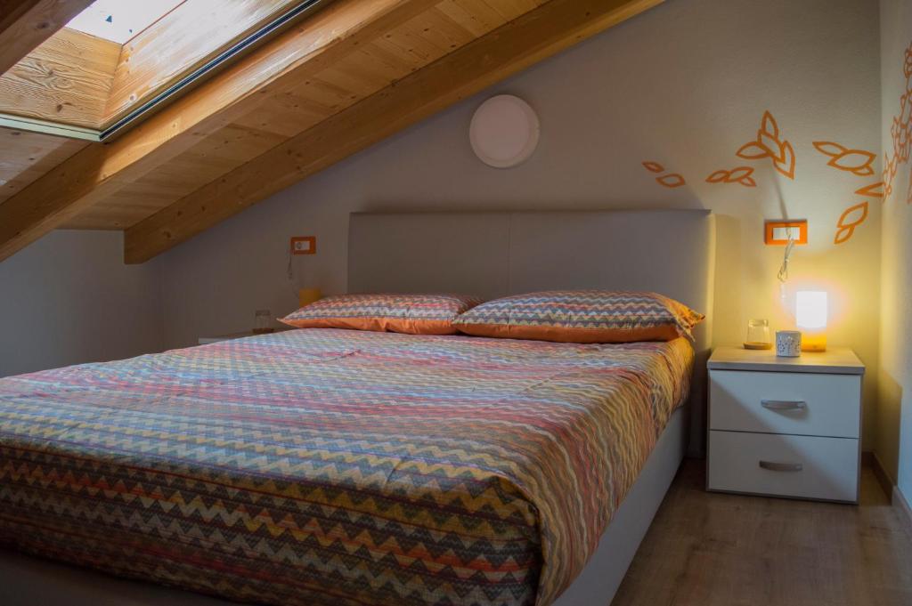 Postel nebo postele na pokoji v ubytování B&B Valtilí