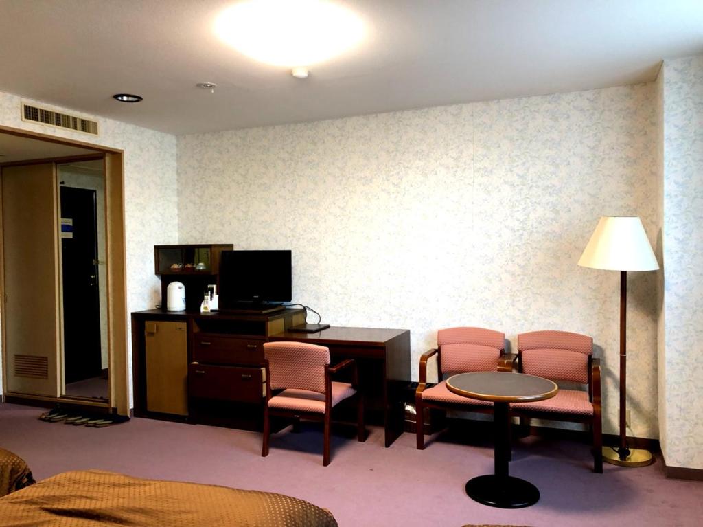 TV a/nebo společenská místnost v ubytování Hotel Oak Forest