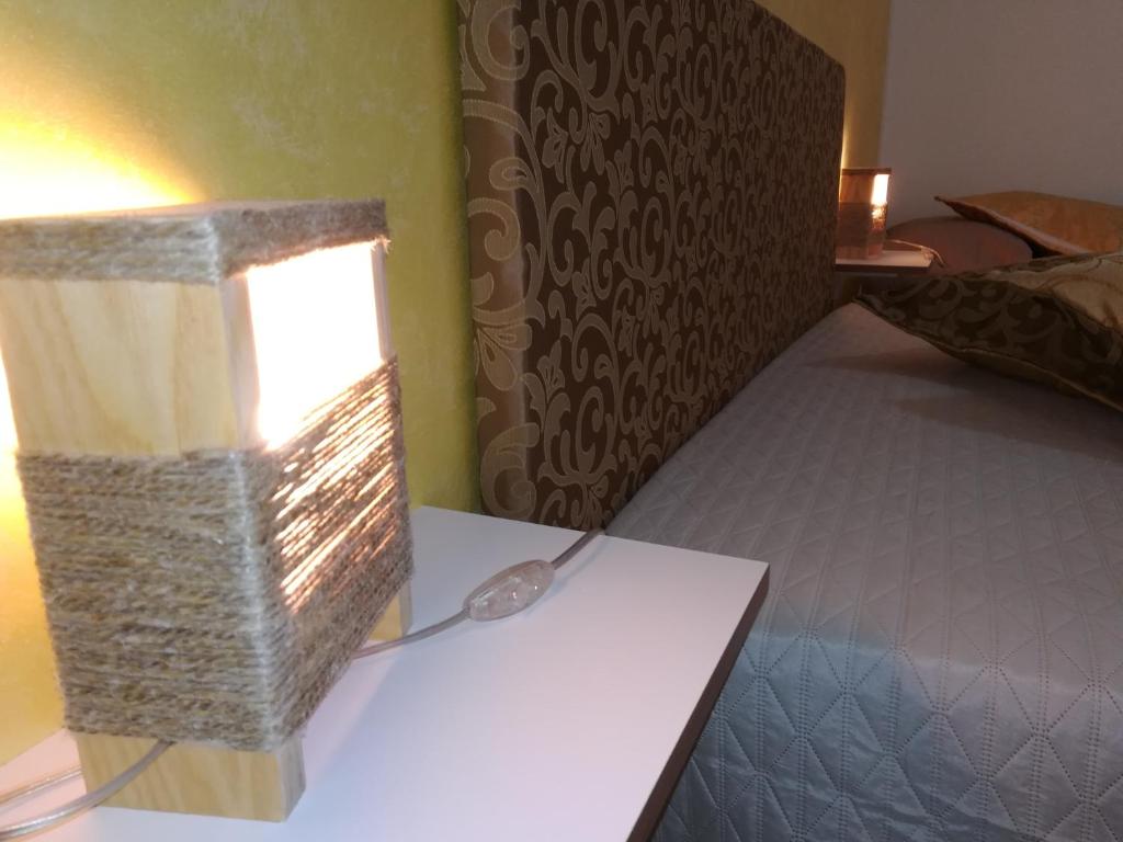 
A bed or beds in a room at Al Profumo di Zagare
