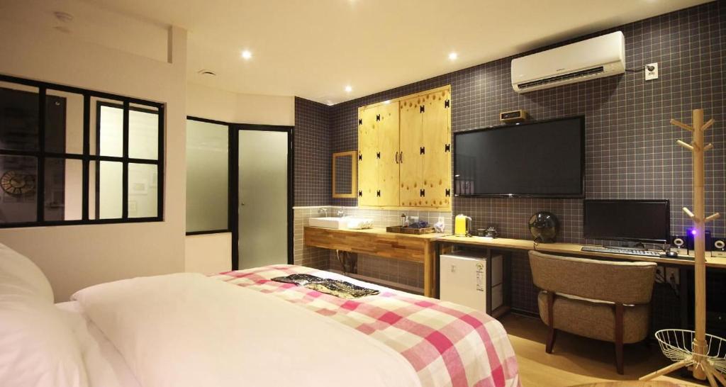 Kuchyň nebo kuchyňský kout v ubytování Hotel 25 Seomyeon