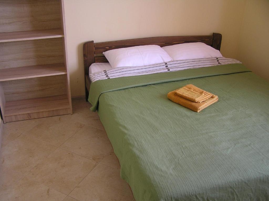 Postel nebo postele na pokoji v ubytování Orange Guest Rooms