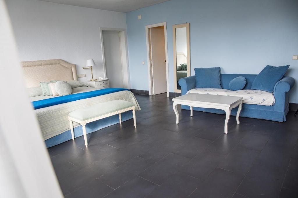 Posezení v ubytování Hotel Prado Real