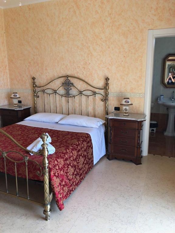 Postel nebo postele na pokoji v ubytování Villa Belvedere di Rita