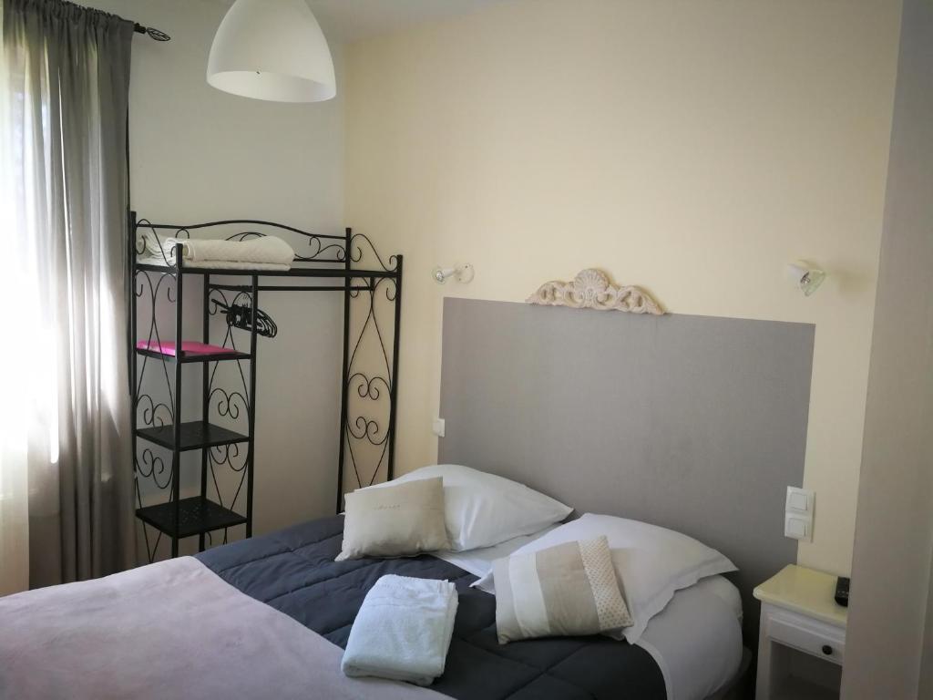 Postel nebo postele na pokoji v ubytování Terrasses de l'Aven