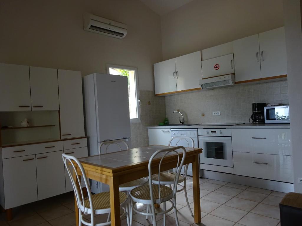 Kuchyň nebo kuchyňský kout v ubytování Camping Mozziconaccio