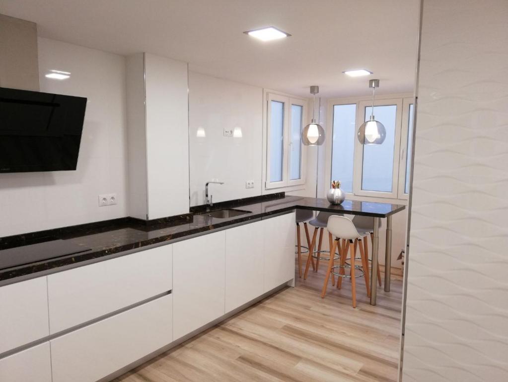 Kuchyňa alebo kuchynka v ubytovaní Apartamento Aurora