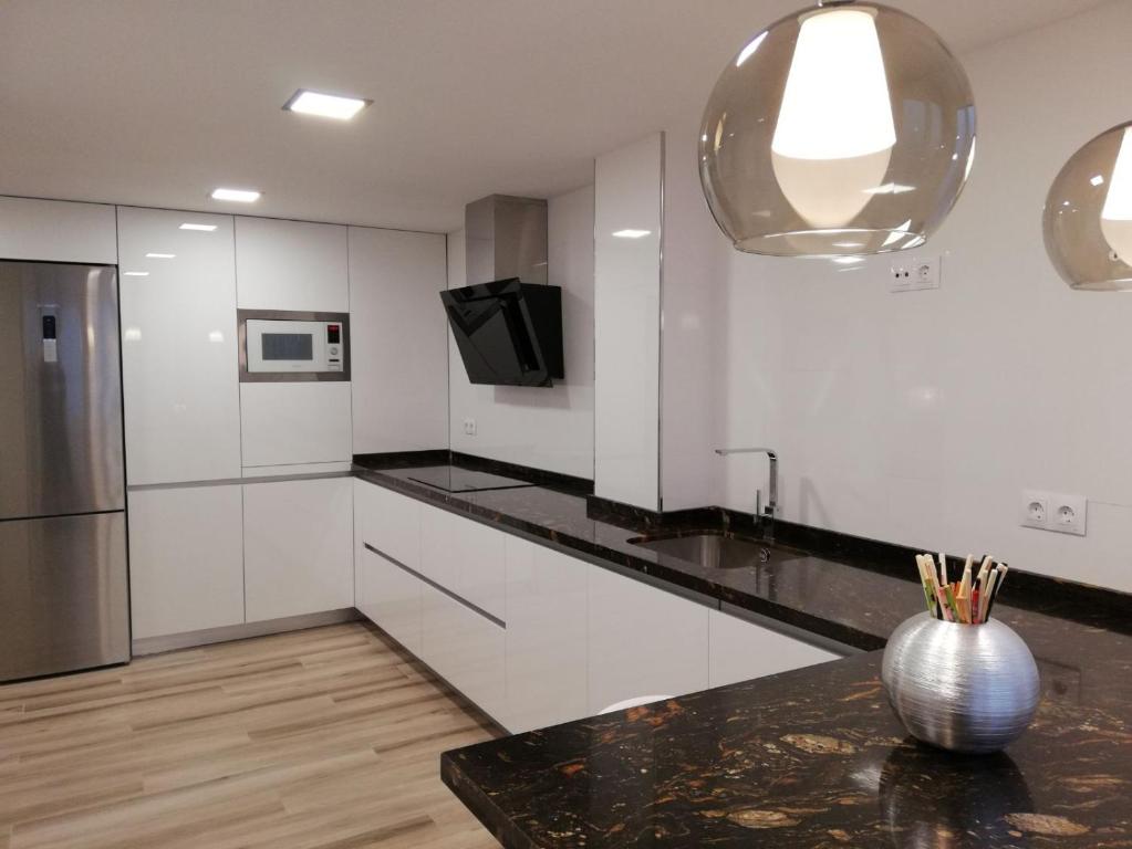 Kuchyňa alebo kuchynka v ubytovaní Apartamento Aurora